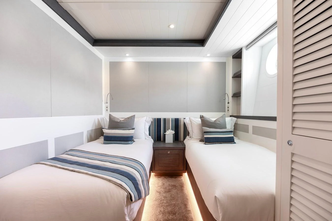 a room with two beds aboard FAR NIENTE Yacht for Sale