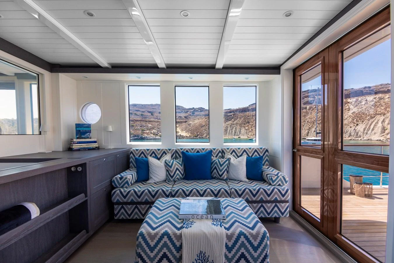 a room with a couch and a table aboard FAR NIENTE Yacht for Sale
