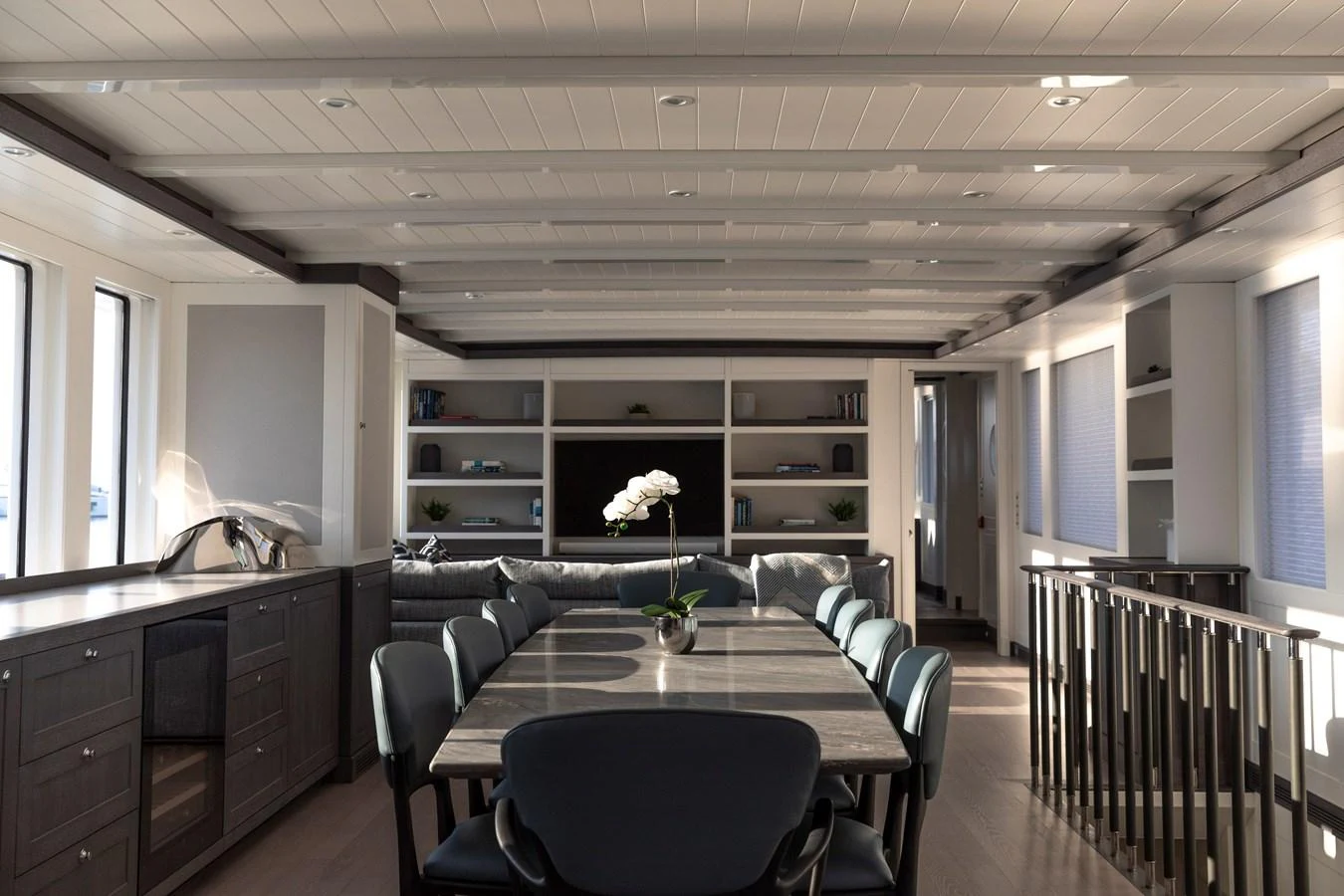 a room with a table and chairs aboard FAR NIENTE Yacht for Sale