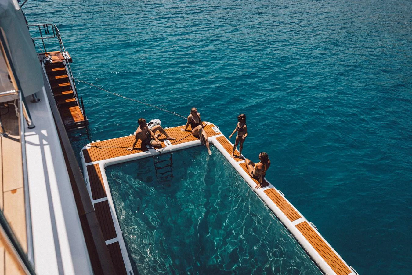 a group of people on a boat aboard FAR NIENTE Yacht for Sale