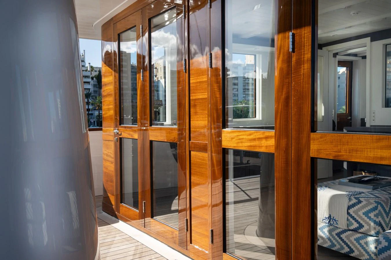 a room with glass doors aboard FAR NIENTE Yacht for Sale