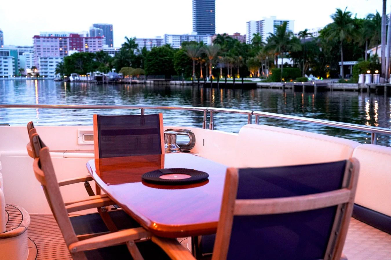 chairs on a deck overlooking a city aboard ANDREA'S REVENGE Yacht for Sale