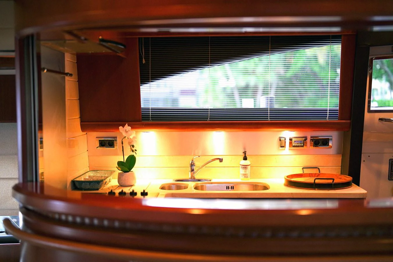 a kitchen with a sink and cabinets aboard ANDREA'S REVENGE Yacht for Sale