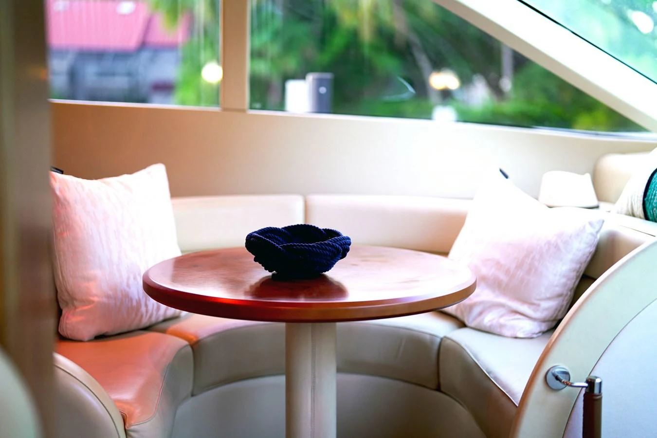 a blue flower on a table aboard ANDREA'S REVENGE Yacht for Sale