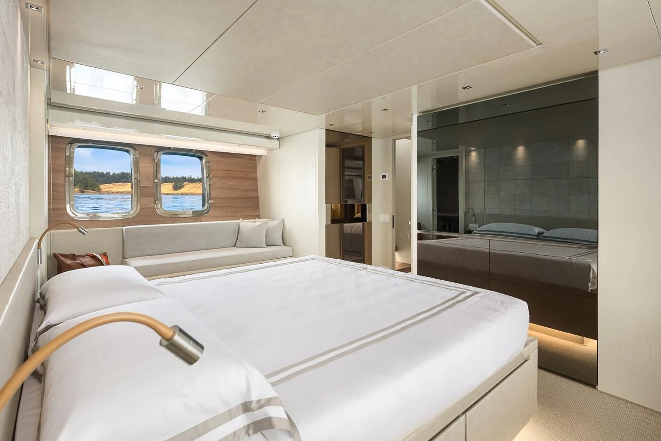 The master stateroom features a spacious bed, large windows, and elegant decor. aboard ESSENZA Yacht for Sale