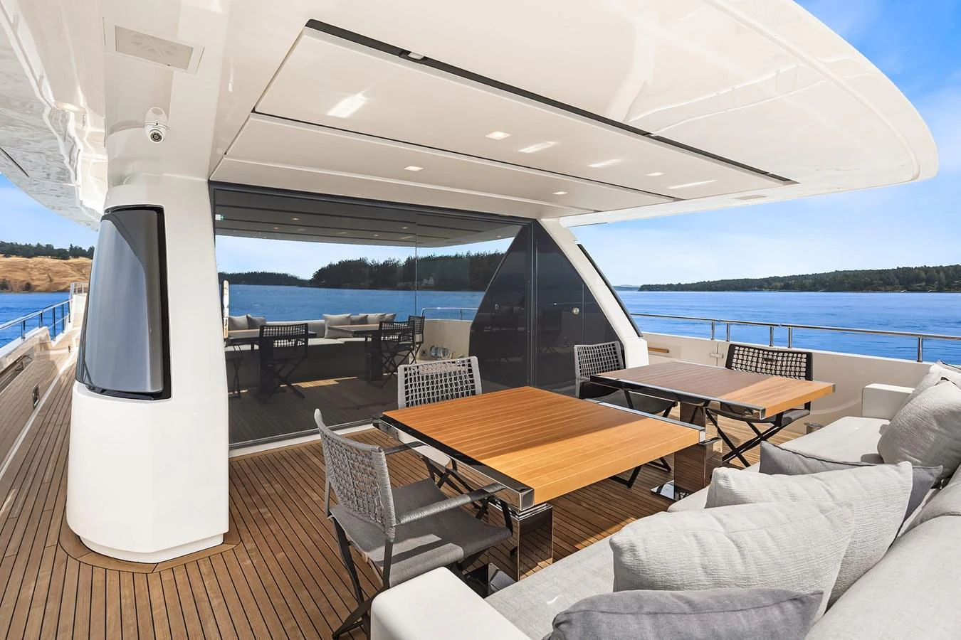 The aft deck offers a spacious and inviting area for alfresco dining and relaxation with stunning views of the water. aboard ESSENZA Yacht for Sale