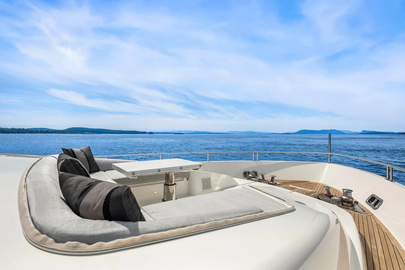The sundeck offers a luxurious lounging area with stunning ocean views. aboard ESSENZA Yacht for Sale