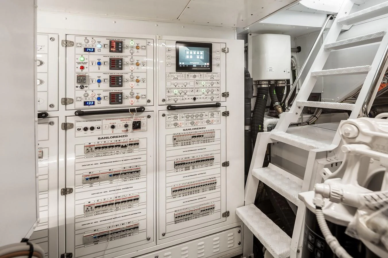 The image showcases the yacht's well-organized and advanced engine room control panels. aboard ESSENZA Yacht for Sale