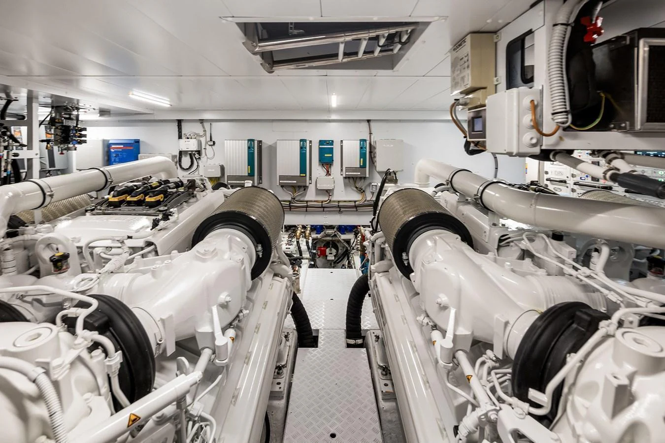 The engine room showcases powerful machinery and advanced systems for optimal yacht performance. aboard ESSENZA Yacht for Sale
