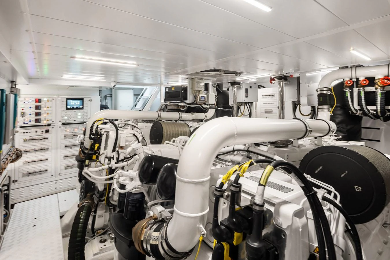 The yacht's engine room showcases advanced machinery and organized systems. aboard ESSENZA Yacht for Sale