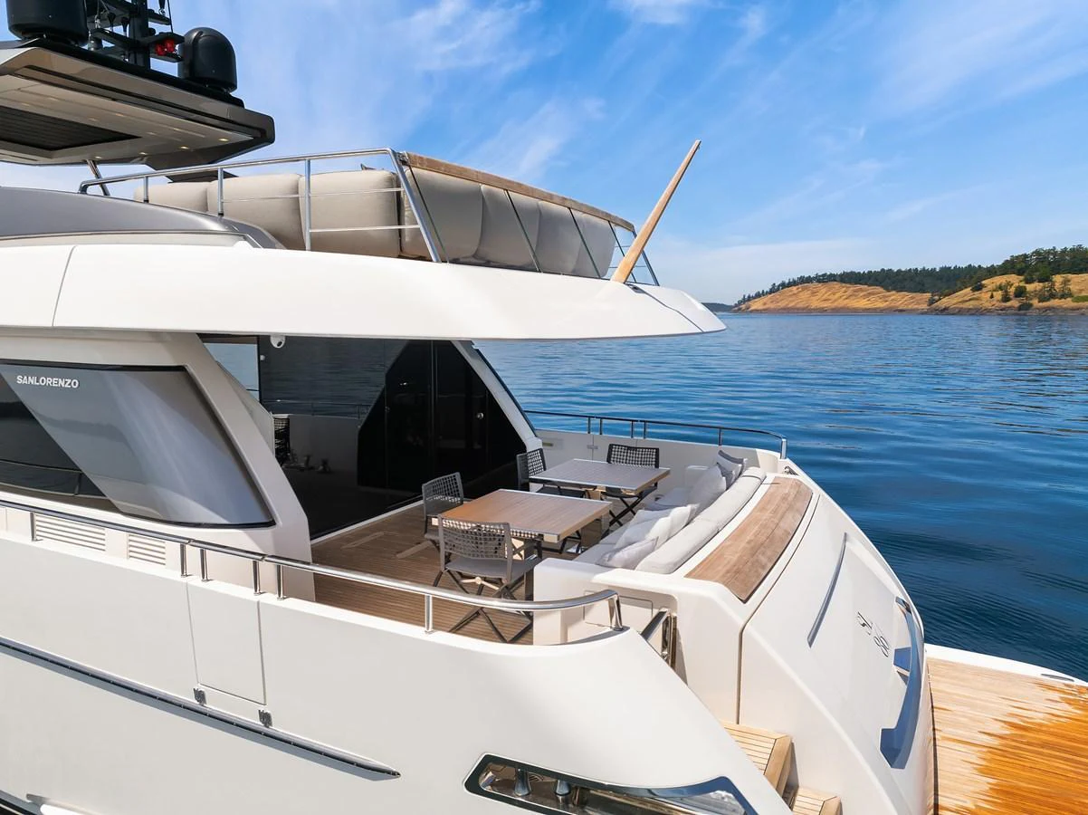 The yacht's aft deck offers a spacious and inviting area for alfresco dining and relaxation with stunning views of the water. aboard ESSENZA Yacht for Sale