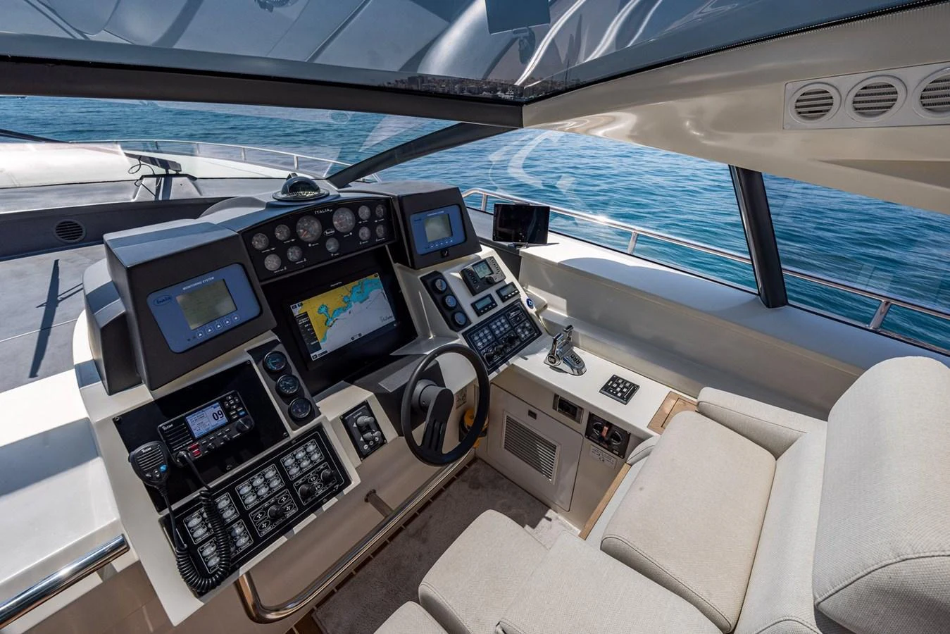 The helm station offers a sophisticated array of navigation and control systems with a panoramic view of the sea. aboard LIONESS Yacht for Sale