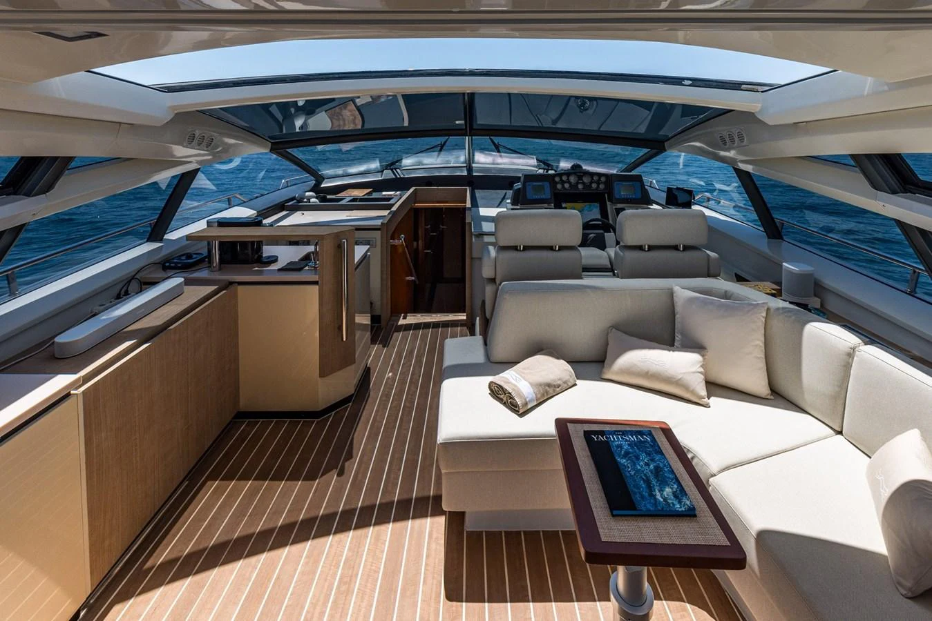 The salon offers a spacious and luxurious seating area with panoramic views. aboard LIONESS Yacht for Sale