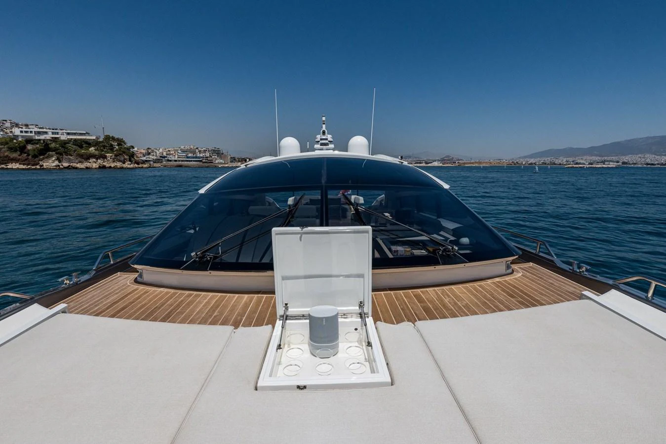 The yacht's bow features a sleek design with ample sunbathing space and a modern hatch. aboard LIONESS Yacht for Sale
