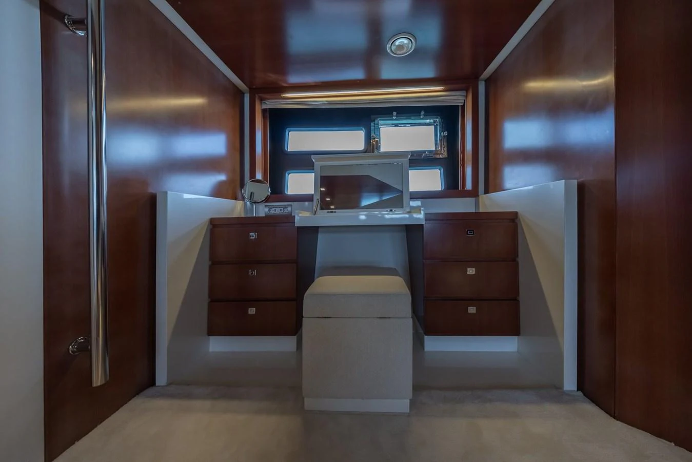 A sophisticated vanity area with ample storage and a sleek design. aboard LIONESS Yacht for Sale
