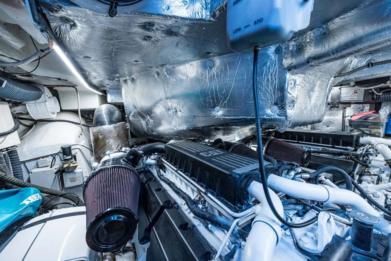 The image showcases the yacht's engine room with advanced machinery and components. aboard LIONESS Yacht for Sale