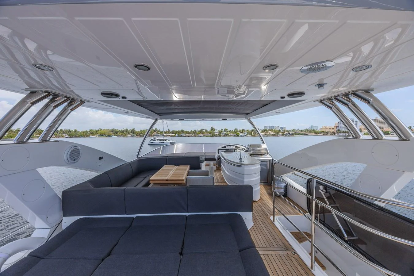 The flybridge offers a spacious and luxurious area for relaxation and entertainment with panoramic views. aboard DIRTY DAWG Yacht for Sale
