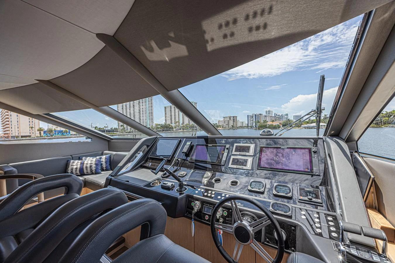 The helm of the yacht offers a sophisticated and modern control area with panoramic views. aboard DIRTY DAWG Yacht for Sale