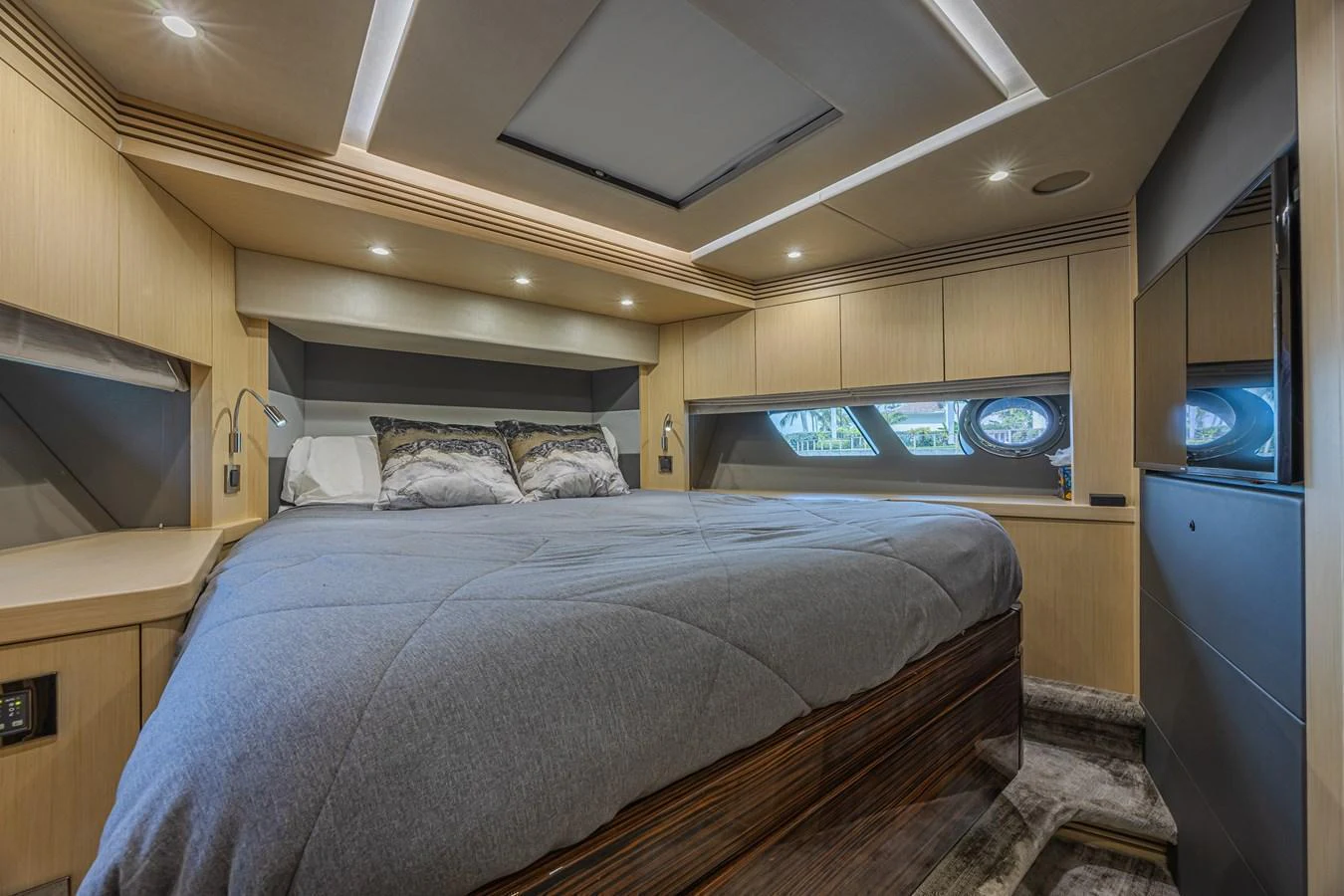 The master stateroom offers a luxurious and spacious sleeping area with modern design elements. aboard DIRTY DAWG Yacht for Sale