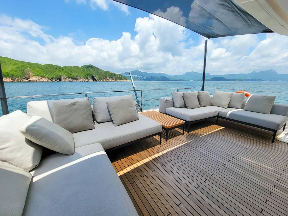 The aft deck offers a spacious and comfortable seating area with stunning ocean views. aboard CUSTOM LINE NAVETTA 33 Yacht for Sale