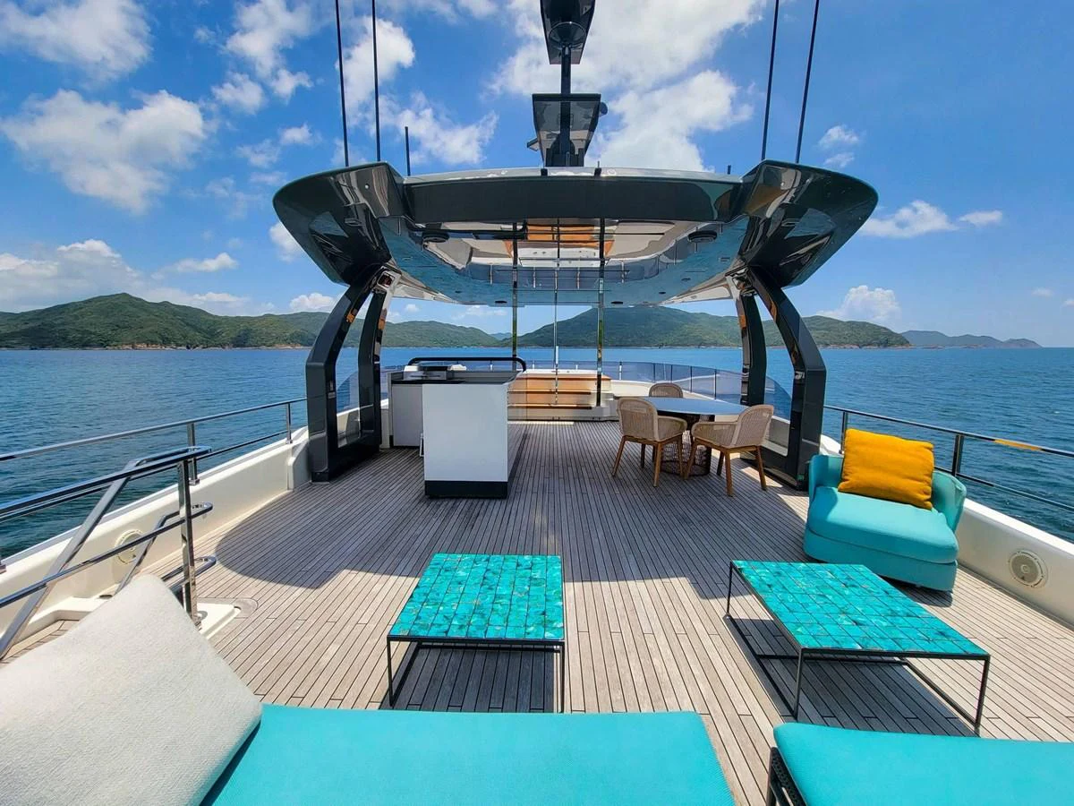The sundeck offers a spacious and luxurious outdoor area with comfortable seating and stunning views. aboard CUSTOM LINE NAVETTA 33 Yacht for Sale