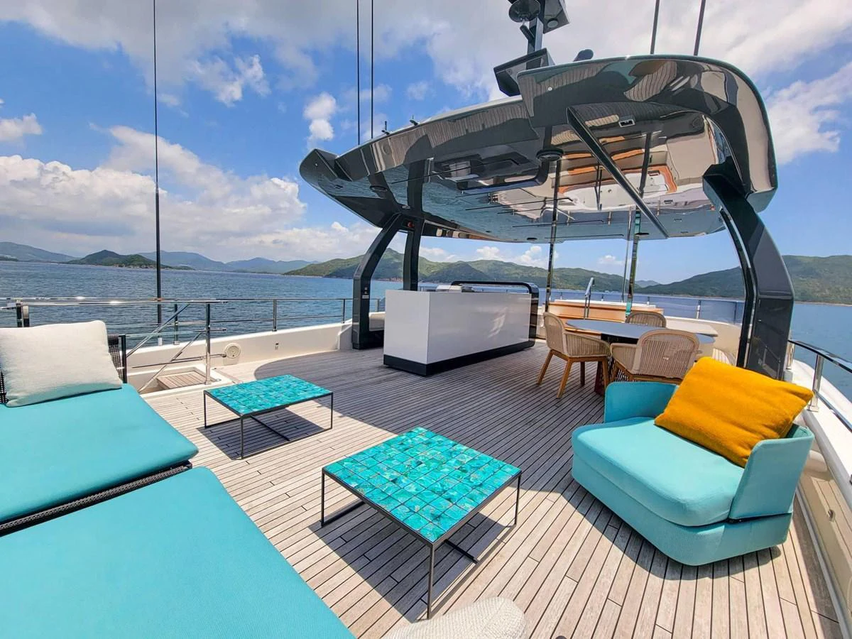 The flybridge offers a spacious and stylish area for relaxation with stunning views of the surrounding waters. aboard CUSTOM LINE NAVETTA 33 Yacht for Sale