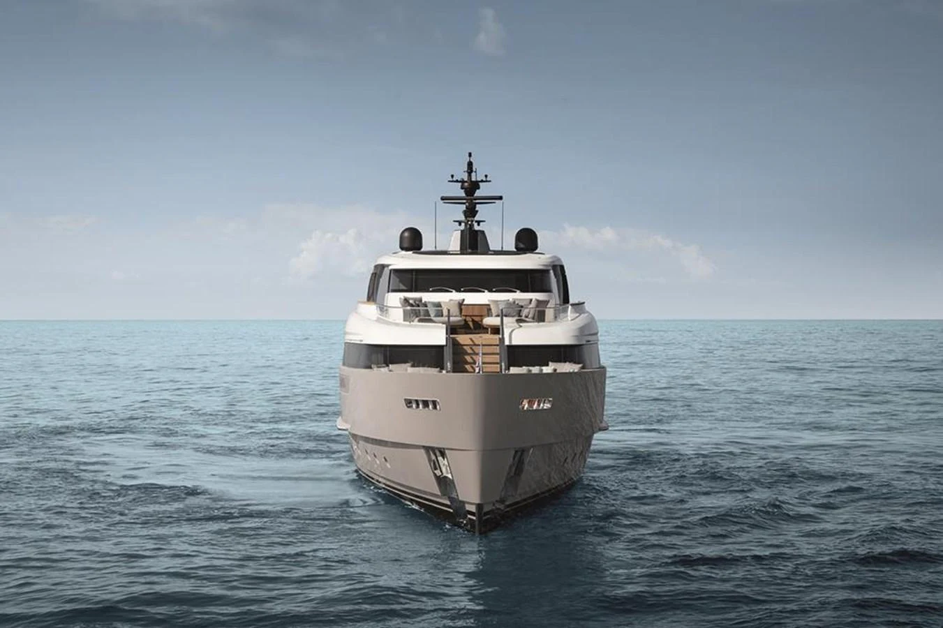 A modern yacht is seen head-on, cruising on calm waters under a clear sky. aboard SANLORENZO SD96 Yacht for Sale