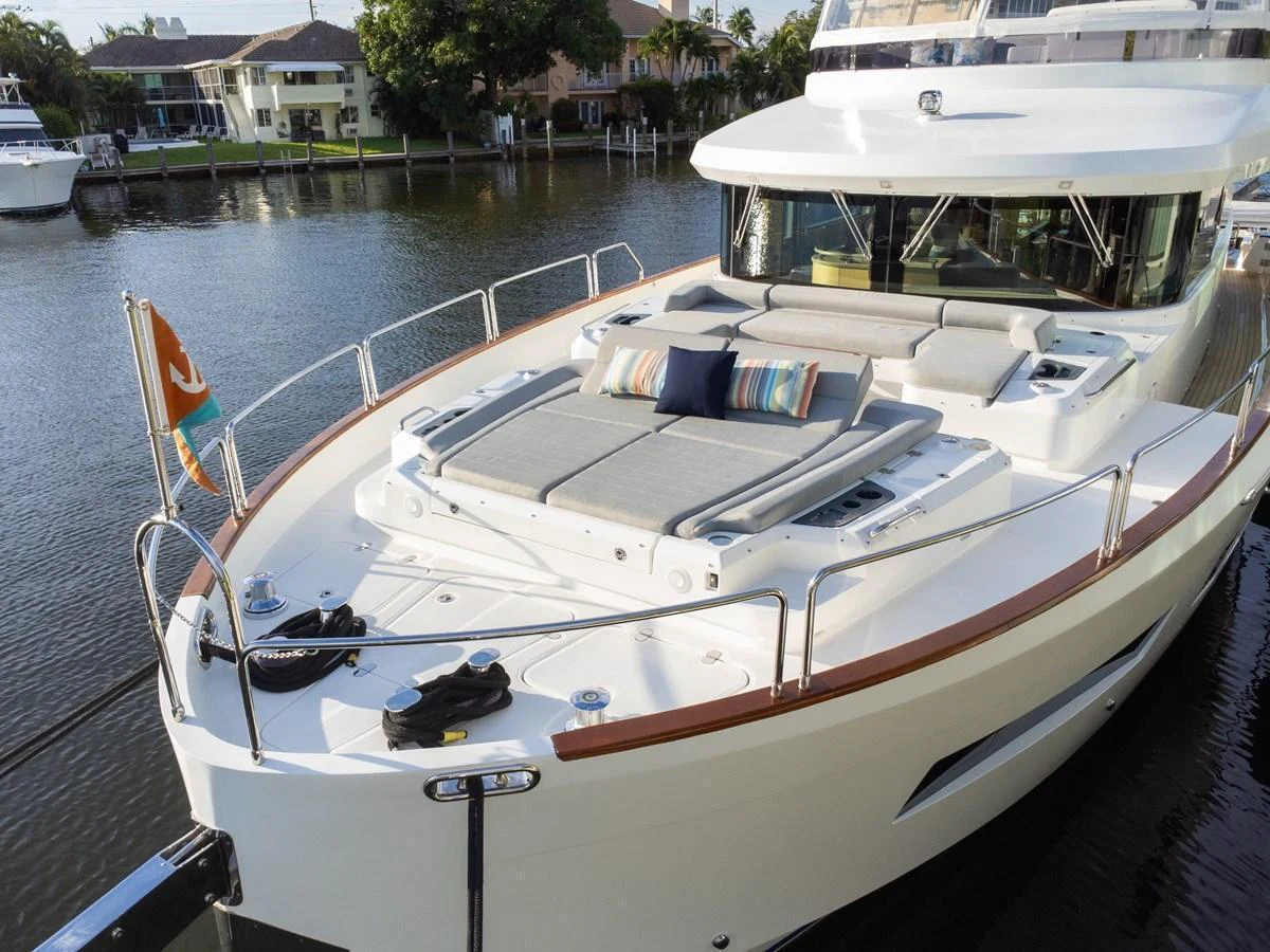 The foredeck of this yacht features spacious sun pads and comfortable seating, perfect for relaxation. aboard FANTASEA Yacht for Sale