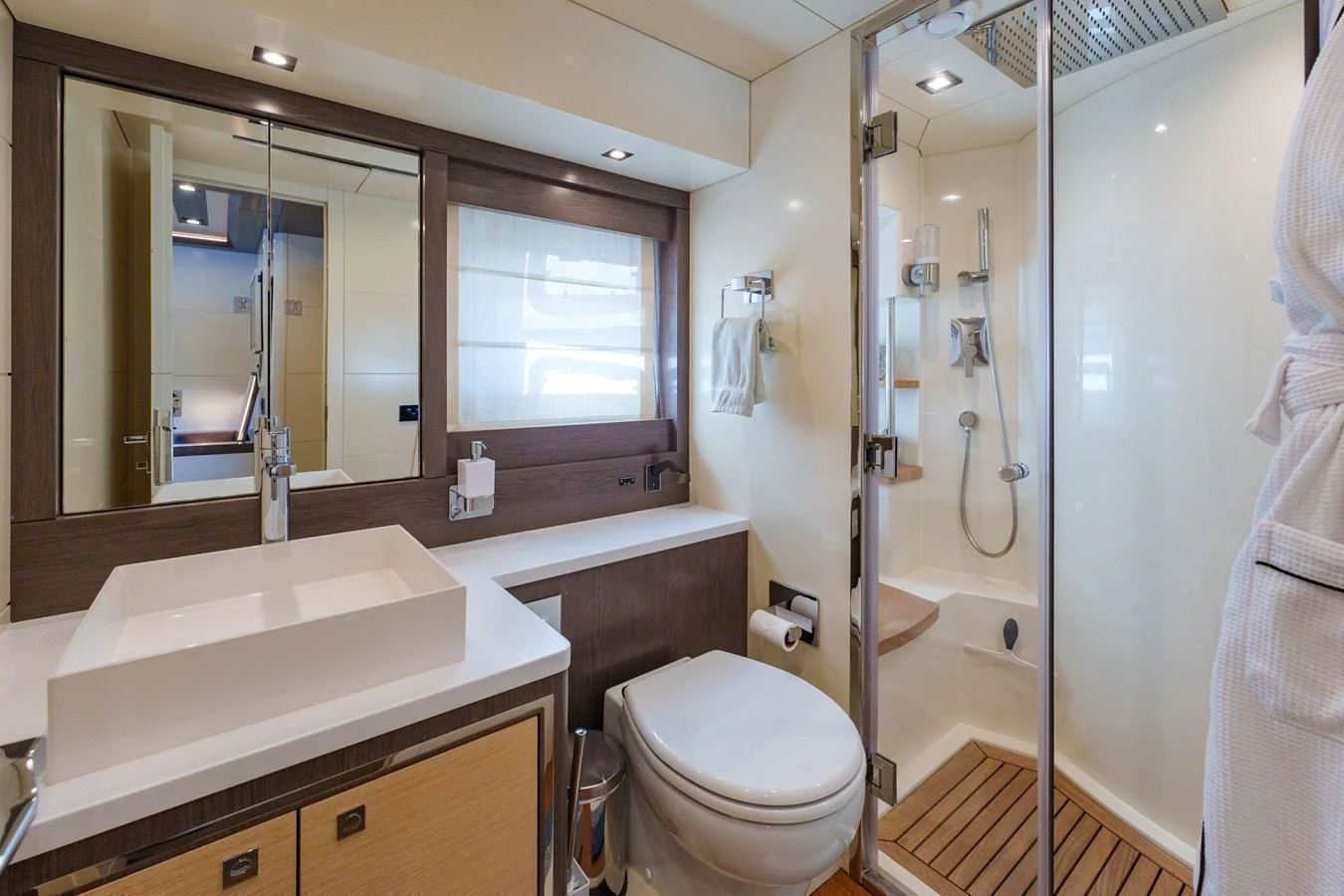 The yacht's bathroom features modern fixtures and a spacious shower area. aboard FANTASEA Yacht for Sale
