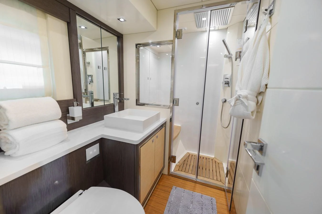 The yacht's bathroom features modern fixtures and a spacious shower area. aboard FANTASEA Yacht for Sale