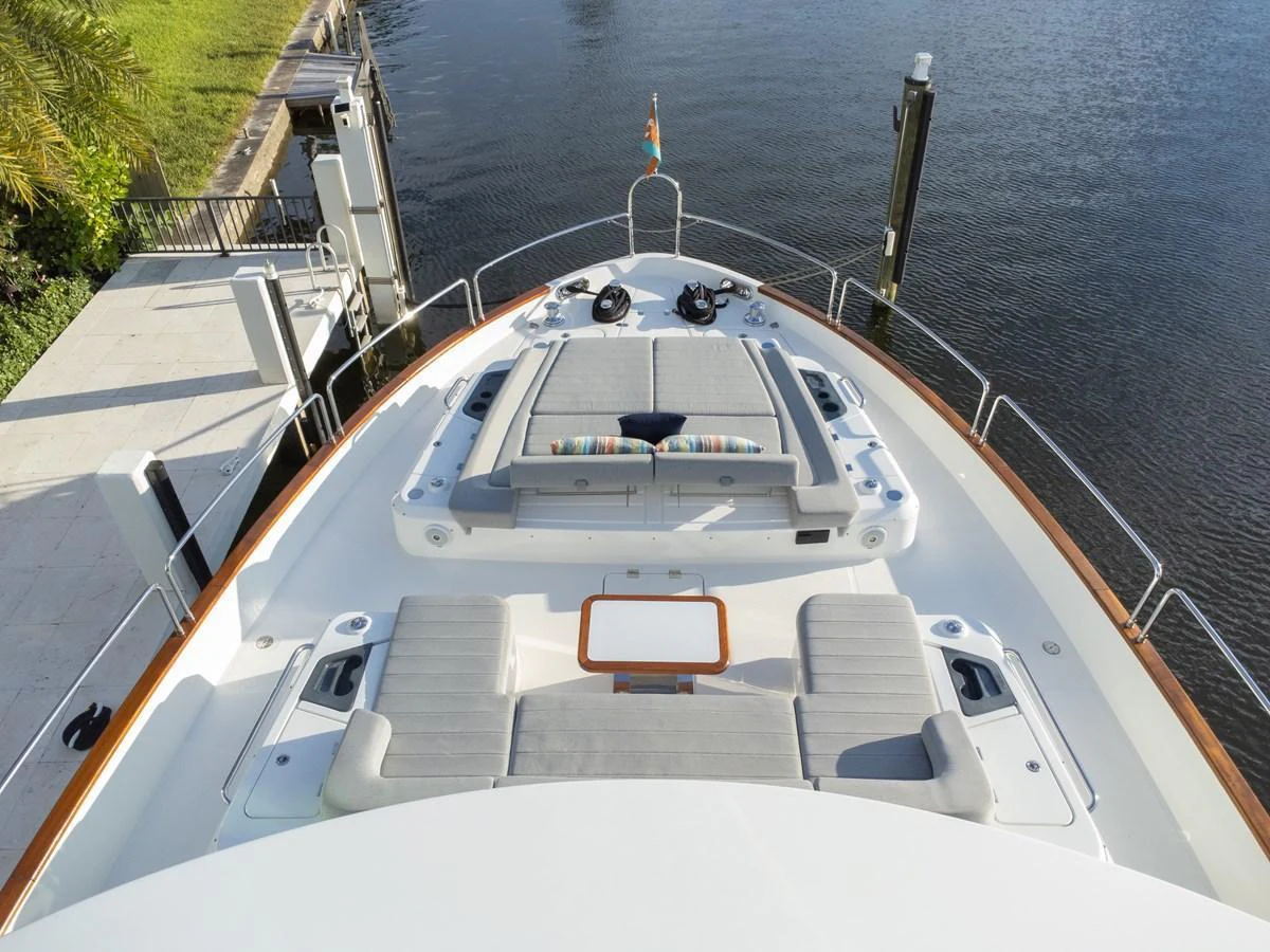 The yacht's foredeck features spacious sunpads and a cozy seating area, perfect for relaxation. aboard FANTASEA Yacht for Sale