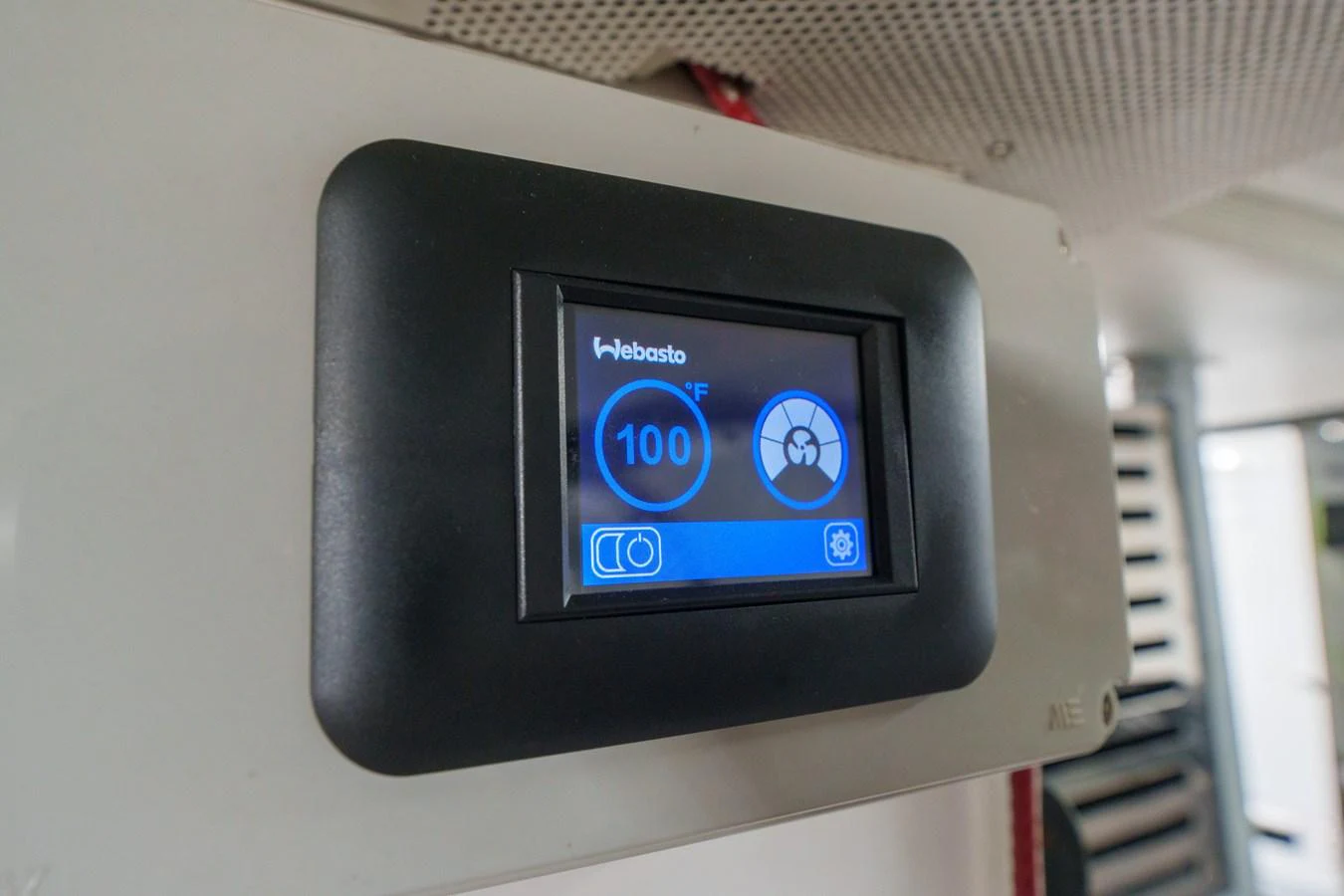 A close-up view of a digital control panel displaying temperature and fan settings. aboard FANTASEA Yacht for Sale