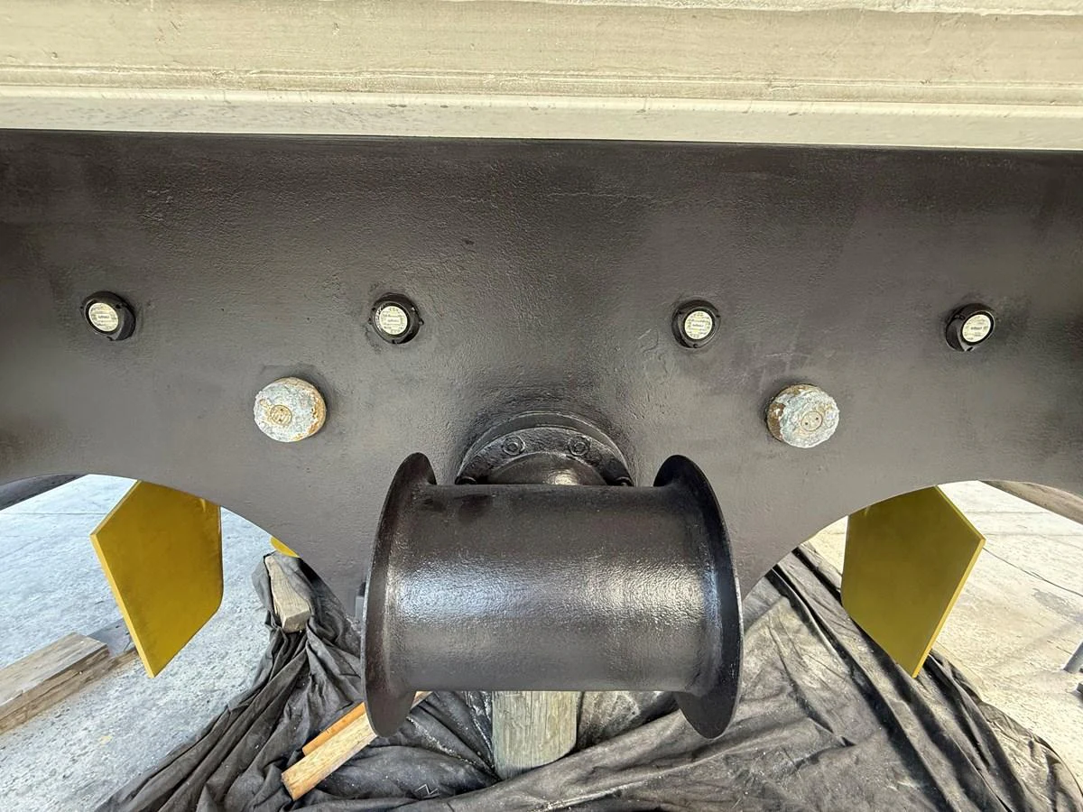 A close-up view of the yacht's hull with visible bolts and a cylindrical fitting. aboard FANTASEA Yacht for Sale