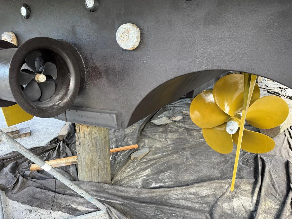 A close-up view of the yacht's propeller and thruster, showcasing the engineering details. aboard FANTASEA Yacht for Sale