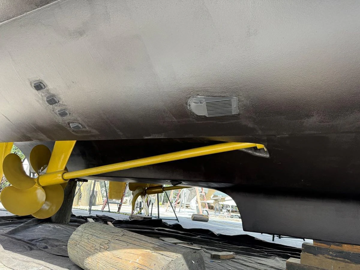 A close-up view of the yacht's underside, showcasing the propeller and rudder components. aboard FANTASEA Yacht for Sale