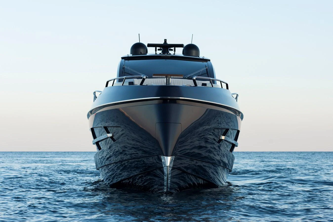 A sleek and modern yacht is captured head-on, showcasing its impressive design and presence on the water. aboard NEW BUILD Yacht for Sale