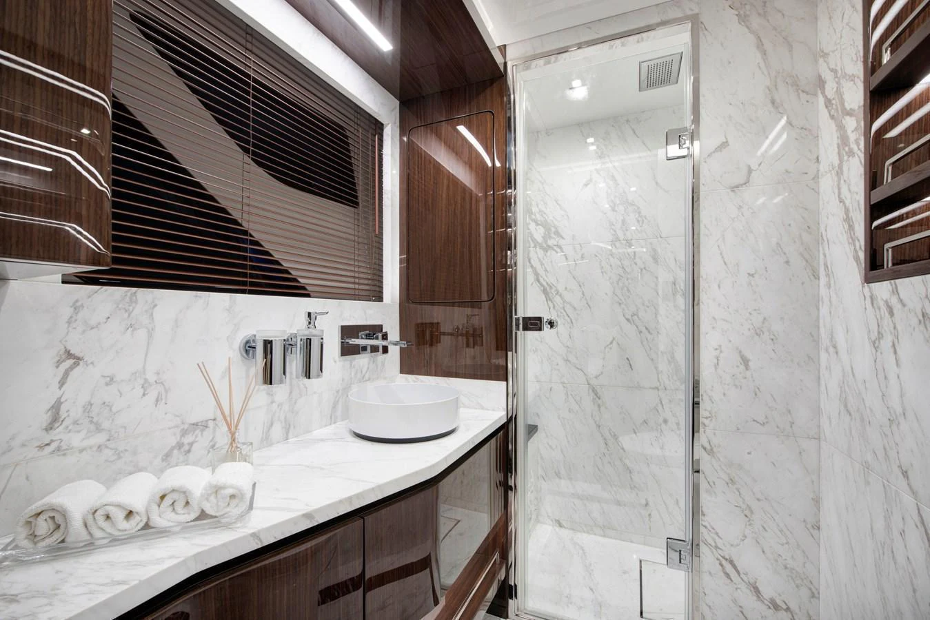 The yacht's bathroom features luxurious marble surfaces and modern fixtures. aboard NEW BUILD Yacht for Sale