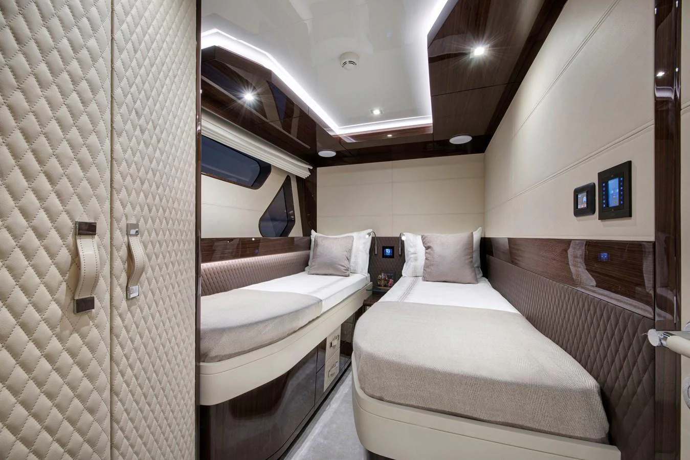 The guest stateroom features twin beds with luxurious bedding and modern finishes. aboard NEW BUILD Yacht for Sale