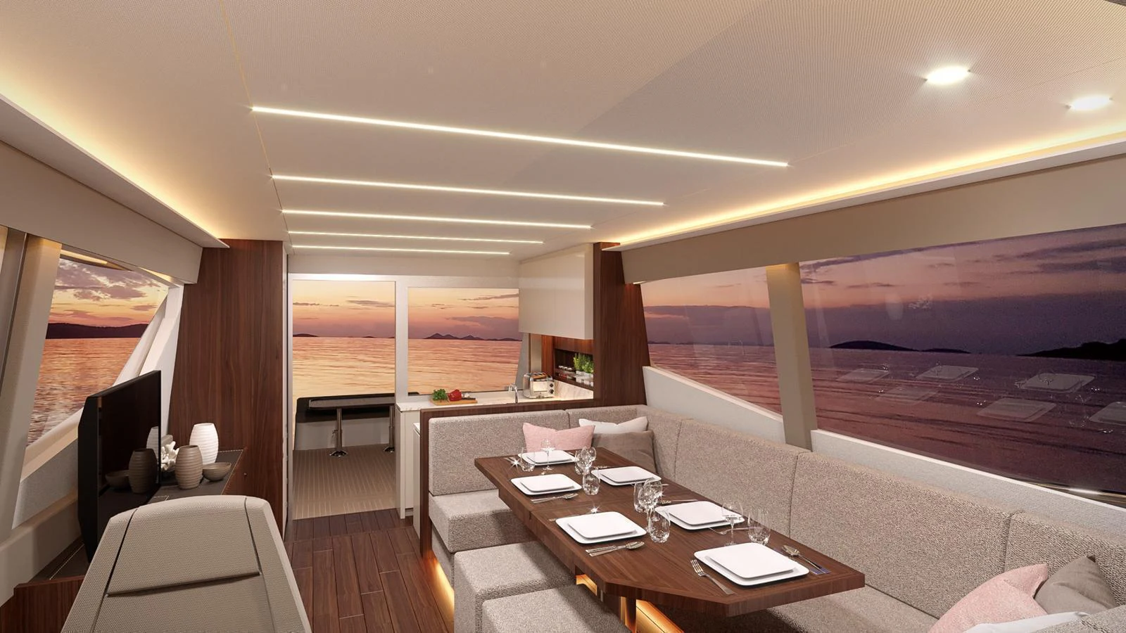 The yacht's salon features elegant dining and lounging areas with panoramic views of the sunset over the water. aboard MONACHUS 70 ST Yacht for Sale