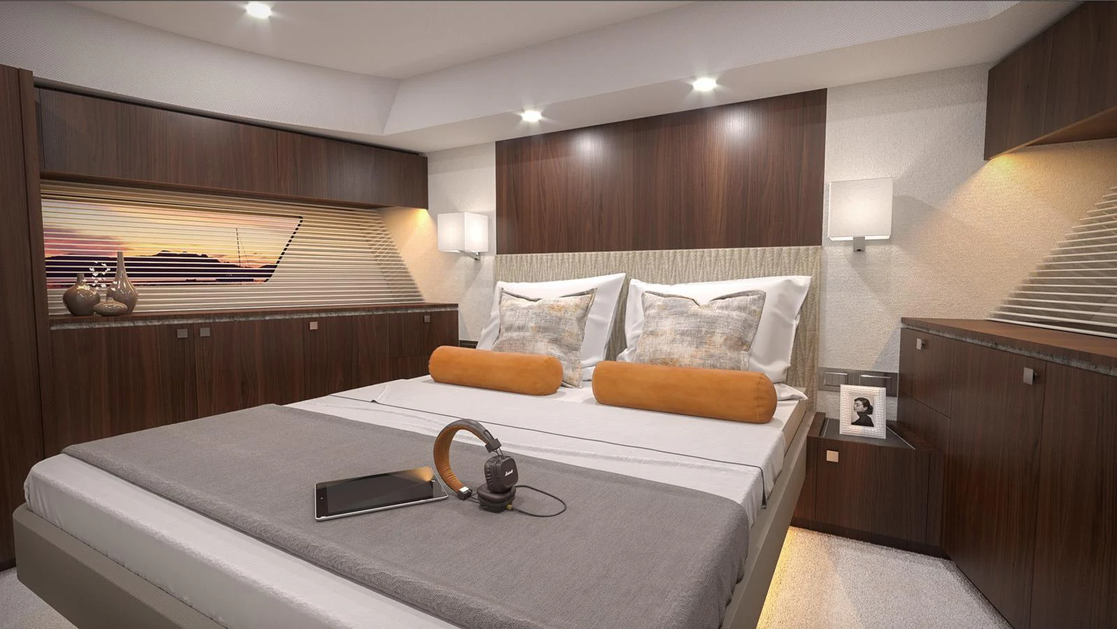 The stateroom features a luxurious bed with modern decor and ambient lighting. aboard MONACHUS 70 ST Yacht for Sale