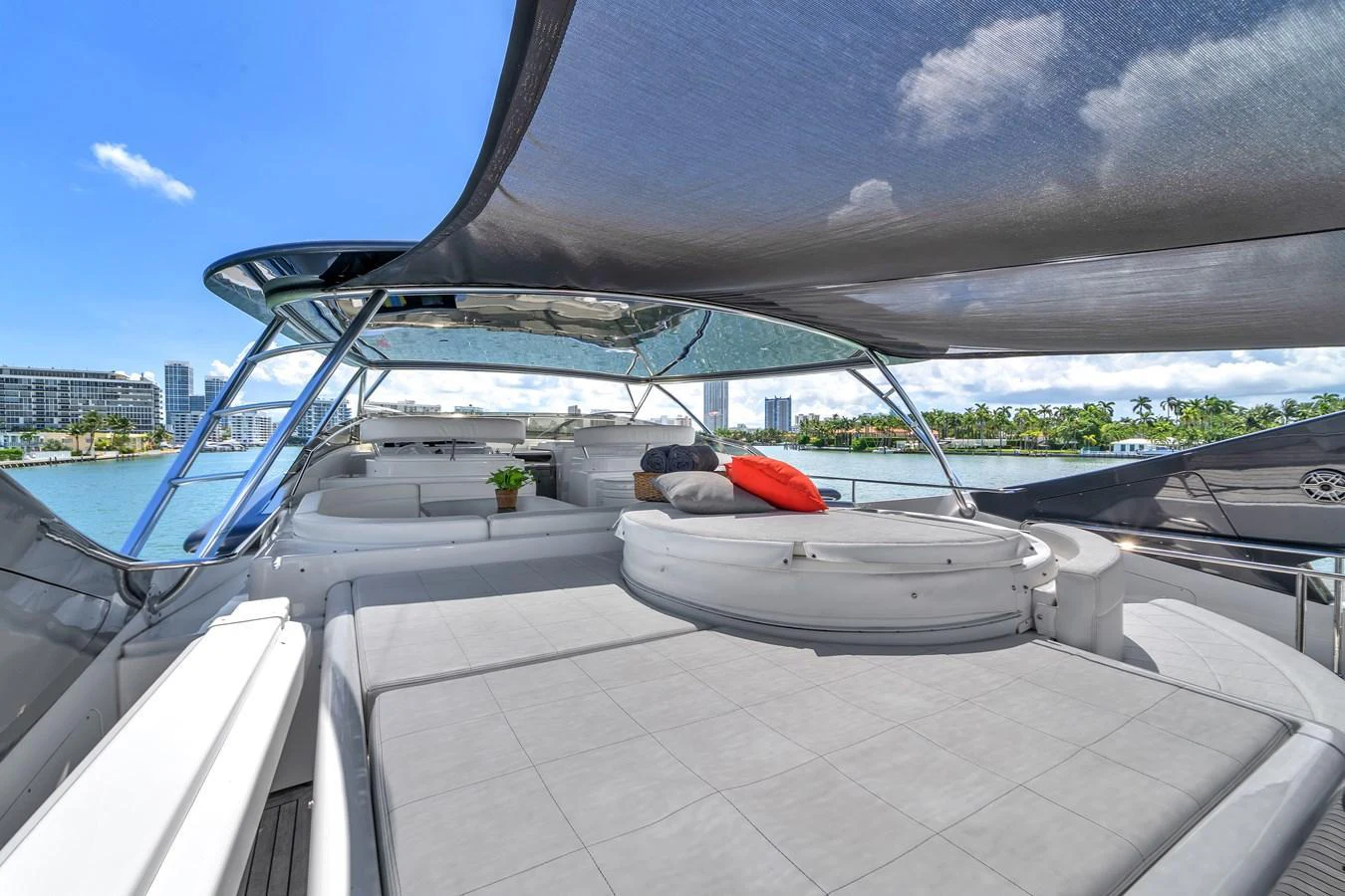 The flybridge offers a spacious lounging area with comfortable seating and stunning views. aboard FERRETTI YACHTS CUSTOM LINE 94 Yacht for Sale