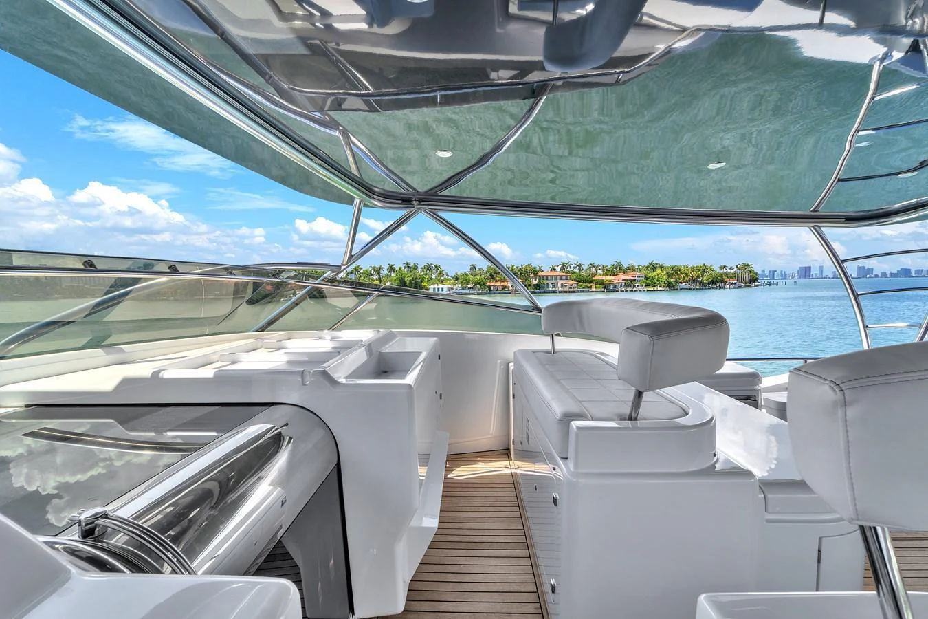 The helm area offers a sleek and modern design with panoramic views of the surrounding waters. aboard FERRETTI YACHTS CUSTOM LINE 94 Yacht for Sale