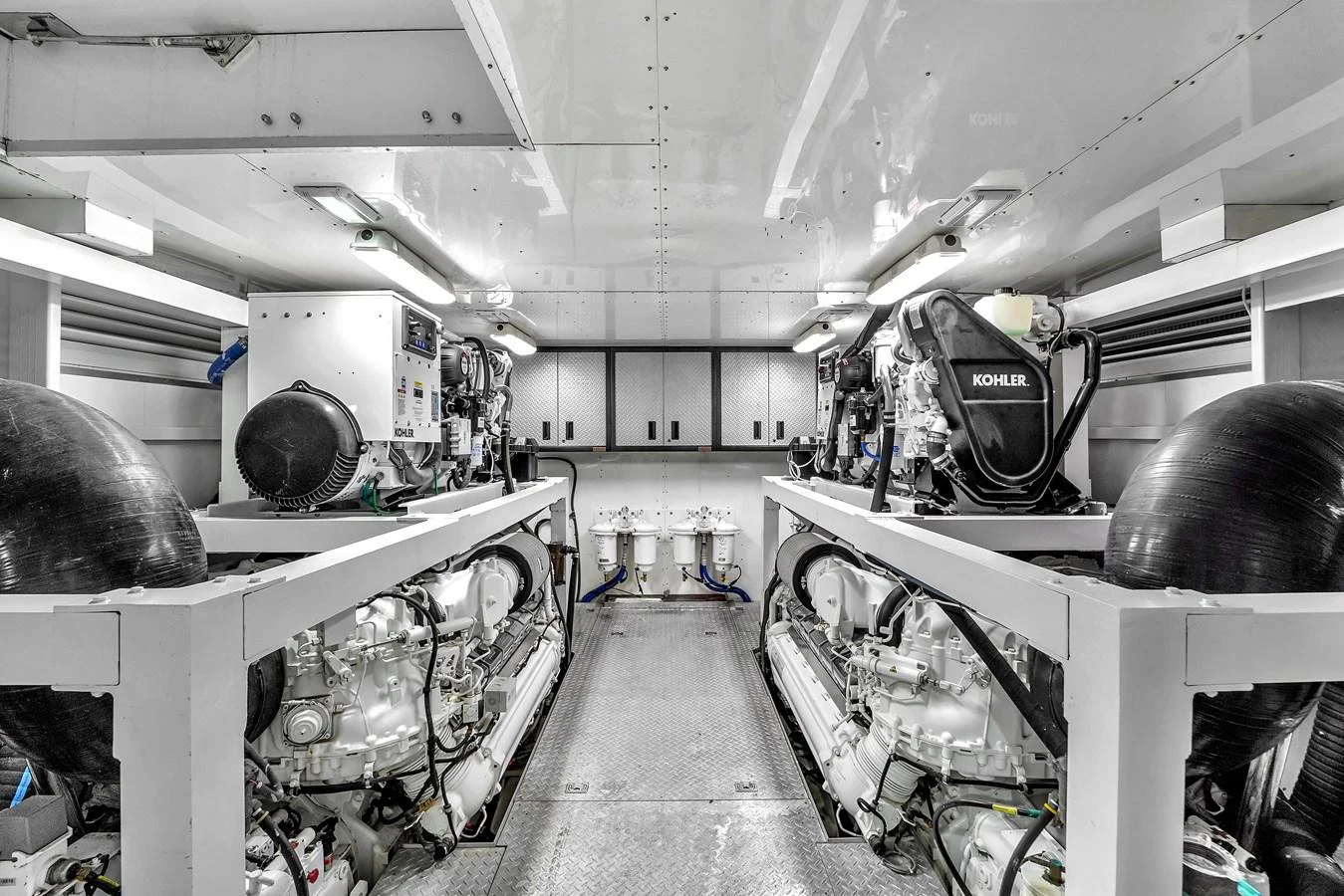 The engine room showcases the yacht's powerful and well-maintained machinery. aboard FERRETTI YACHTS CUSTOM LINE 94 Yacht for Sale