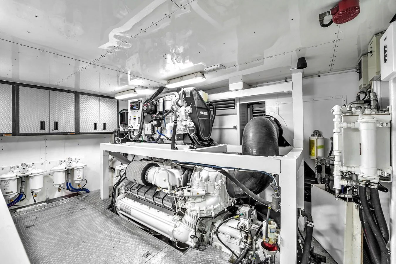 The image showcases the yacht's pristine and well-organized engine room, highlighting its advanced machinery. aboard FERRETTI YACHTS CUSTOM LINE 94 Yacht for Sale