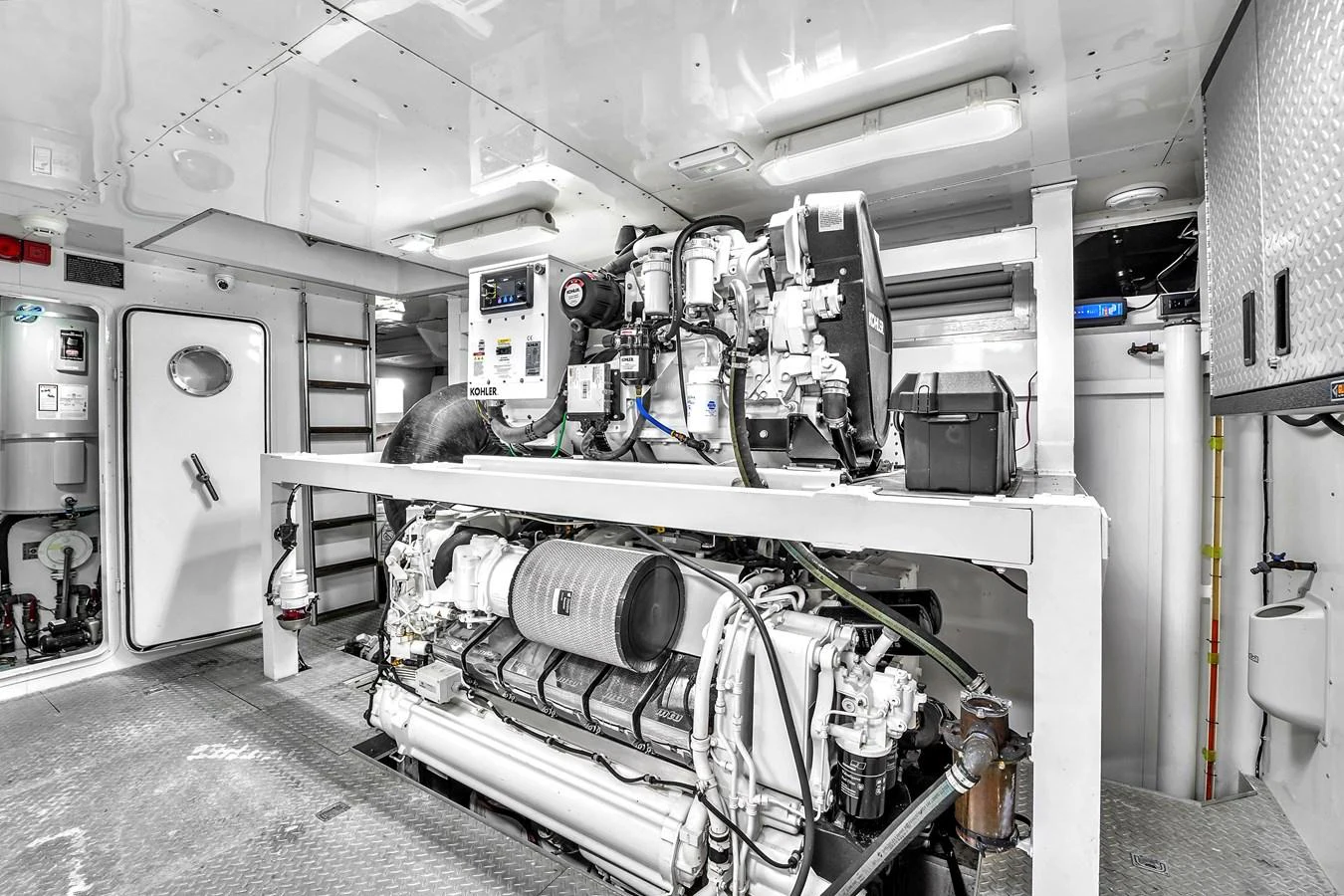 The engine room showcases the yacht's powerful and well-maintained machinery. aboard FERRETTI YACHTS CUSTOM LINE 94 Yacht for Sale