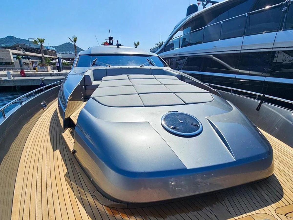 The foredeck of this yacht features a sleek, modern design with ample sunbathing space. aboard HONEY BADGER Yacht for Sale
