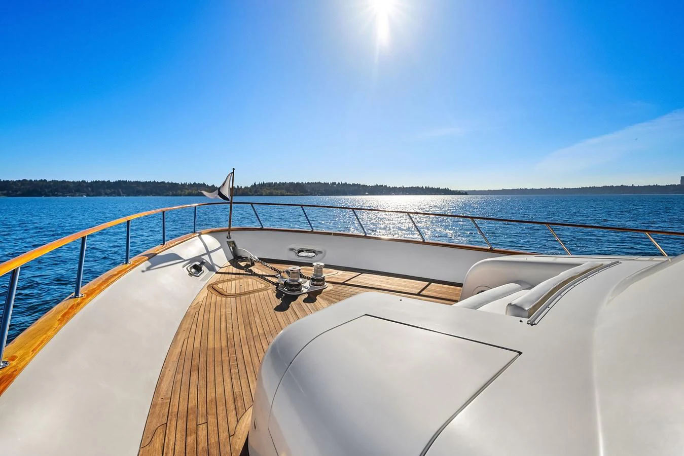The yacht's bow offers a stunning view over the water, with sleek design and ample deck space. aboard MI AMERE Yacht for Sale