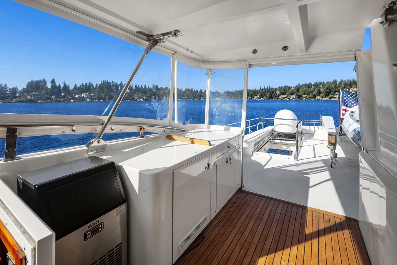 The aft deck offers a spacious and inviting area with stunning views of the water. aboard MI AMERE Yacht for Sale