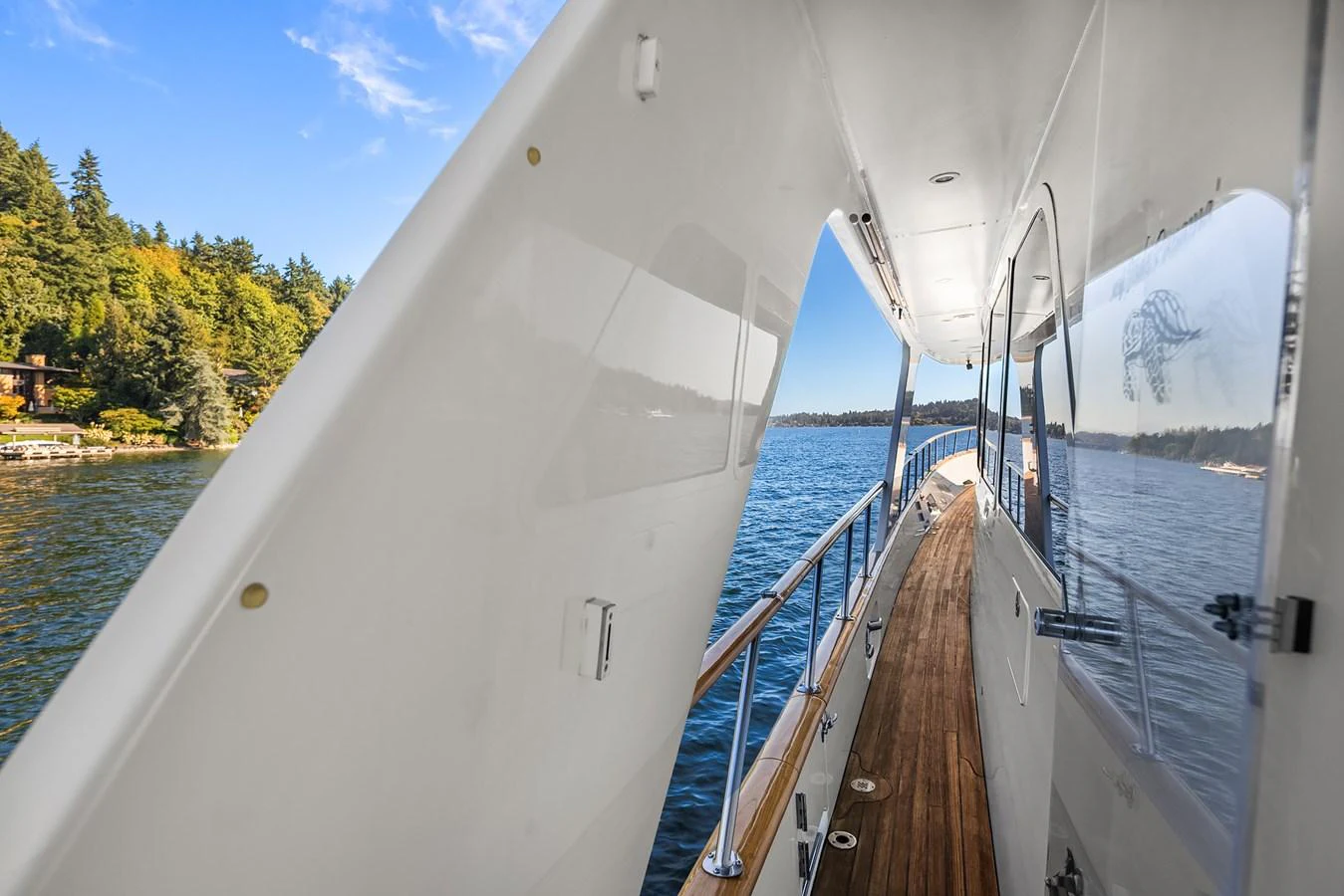 The side deck offers a sleek passage with stunning views of the surrounding waters. aboard MI AMERE Yacht for Sale