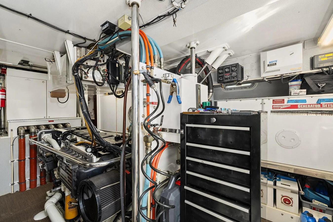 The engine room is equipped with advanced machinery and tools, showcasing the yacht's technical sophistication. aboard MI AMERE Yacht for Sale